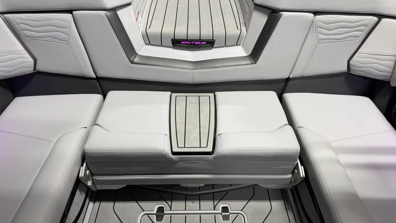 Slide: The Image of Interior of a modern boat with gray upholstery and sleek details. - 23