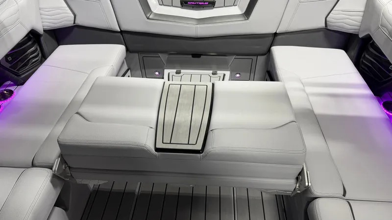 Slide: The Image of Interior of a modern boat with gray upholstery and purple lighting. - 24