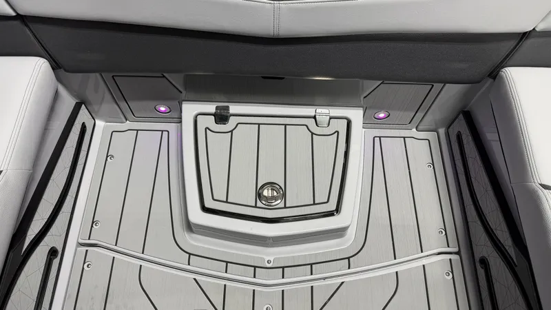 Slide: The Image of The image shows a boat's floor with gray planks and purple lighting. - 26