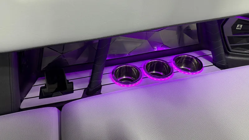 Slide: The Image of Illuminated cup holders on a boat with purple LED lights. - 35