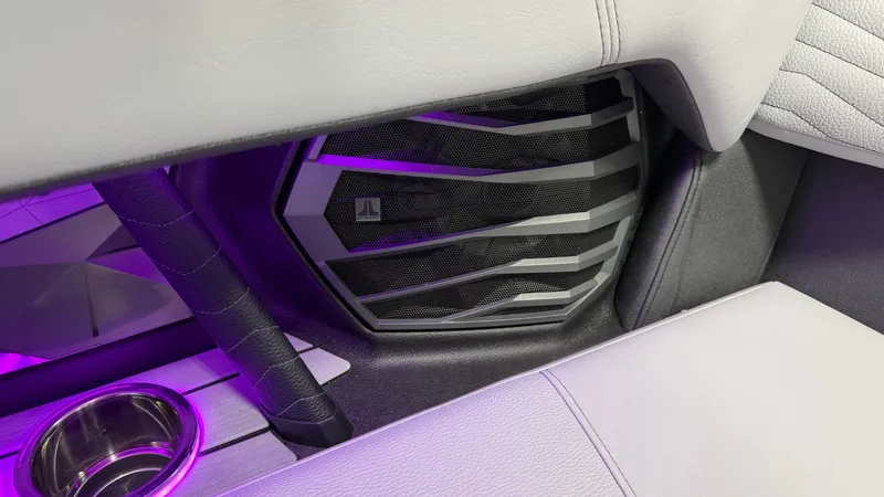 Slide: The Image of Close-up of a speaker in a modern boat with purple lighting. - 38