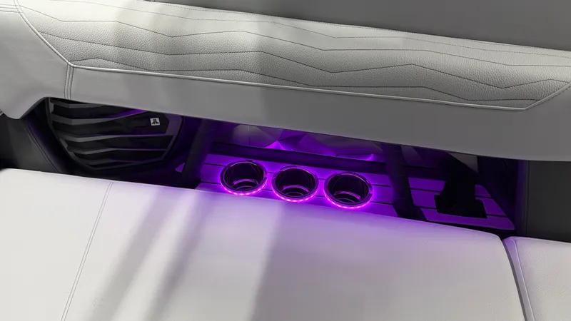 Slide: The Image of Illuminated cup holders in a modern boat with purple LED lighting. - 41