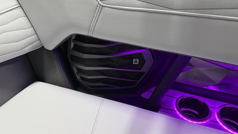 Slide: The Image of Close-up of a boat interior with purple lighting and a speaker. - 42
