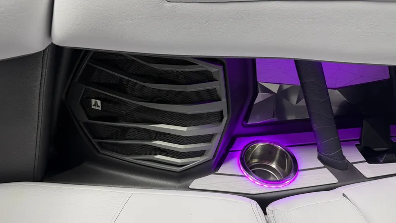 Slide: The Image of Speaker and cup holder with purple lighting in a boat. - 49