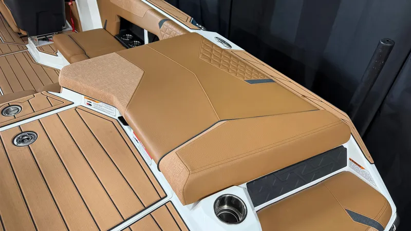 Slide: The Image of The image shows the luxurious upholstery design of the 2026 Nautique Super Air Nautique GS20. - 14