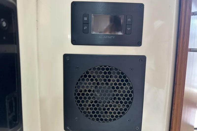 Slide: The Image of Control panel and vent on 1998 Mainship 40 Sedan Bridge yacht interior. - 20