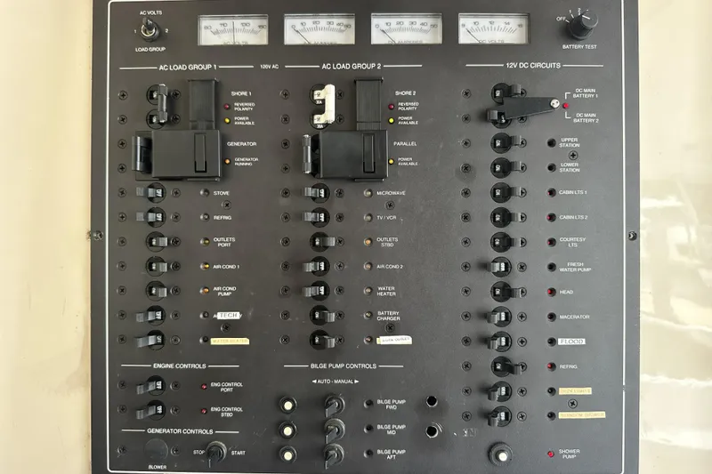Slide: The Image of Electrical control panel of a 1998 Mainship 40 Sedan Bridge boat. - 25