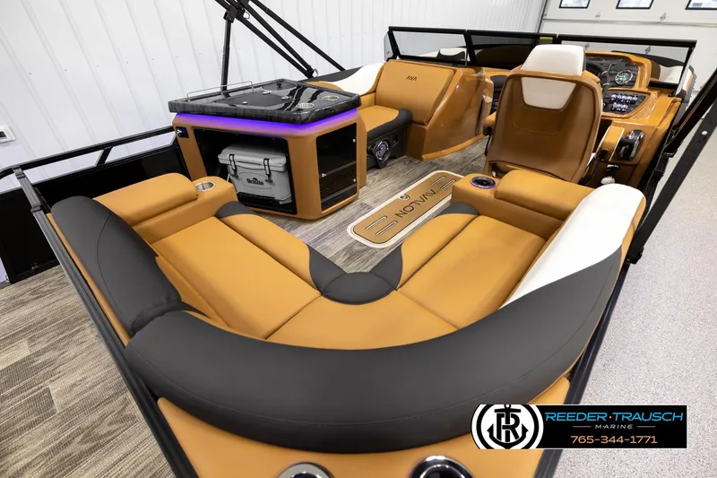 Slide: The Image of Luxurious interior of 2026 Avalon LSZ ELW boat with tan seating and modern amenities. - 12