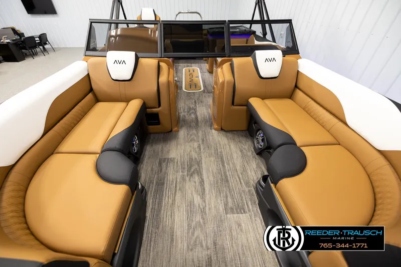 Slide: The Image of Luxurious interior of 2026 Avalon LSZ ELW boat with tan and black seating. - 13