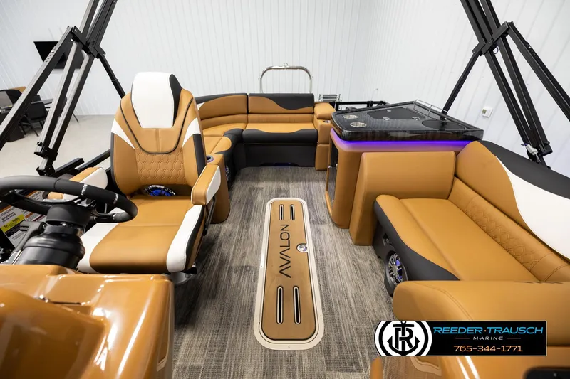 Slide: The Image of Luxurious interior of 2026 Avalon LSZ ELW pontoon boat with plush seating and modern design. - 14