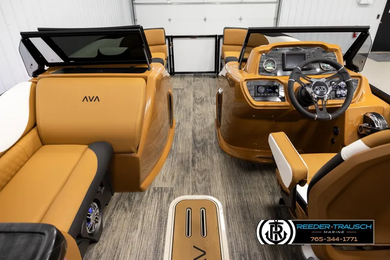 Slide: The Image of 2026 Avalon LSZ ELW boat interior with tan seating and modern dashboard. - 17
