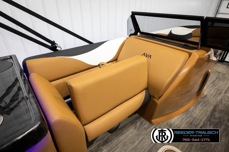 Slide: The Image of 2026 Avalon LSZ ELW boat interior with tan seating and black accents. - 23