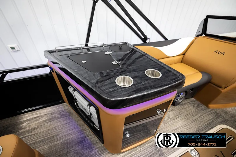 Slide: The Image of 2026 Avalon LSZ ELW boat interior with sleek bar area and modern seating. - 26