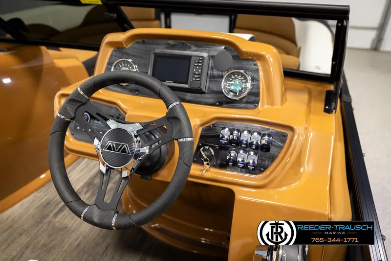 Slide: The Image of 2026 Avalon LSZ ELW boat dashboard with steering wheel and control panel. - 28