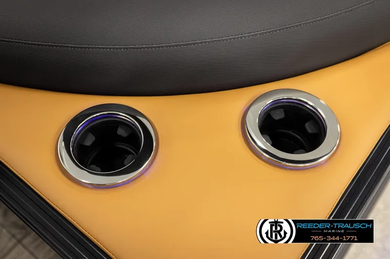 Slide: The Image of 2026 Avalon LSZ ELW boat interior with dual cup holders and premium seating. - 42