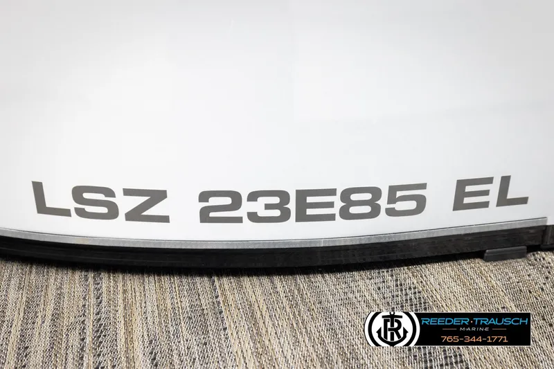Slide: The Image of 2026 Avalon LSZ ELW boat with LSZ 23E85 EL branding, Reeder-Trausch Marine logo. - 48