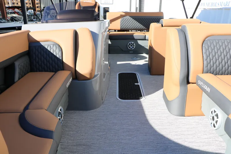 Slide: The Image of Luxurious interior of 2026 Sylvan L3 DLZ Bar Tri-Toon with plush seating and modern design. - 16