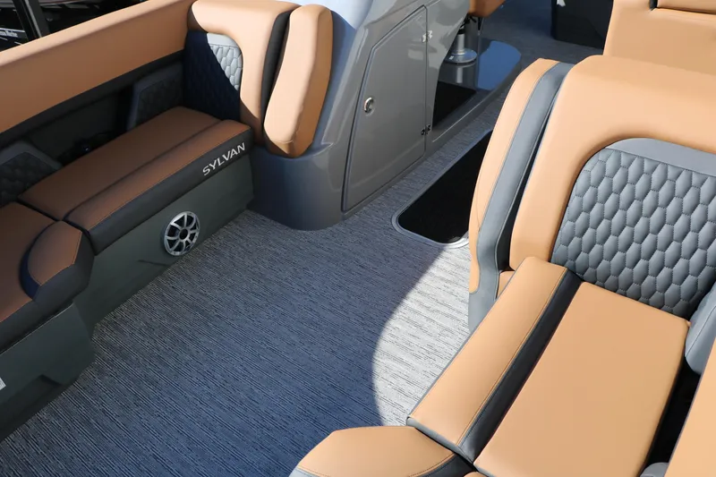 Slide: The Image of Luxurious interior of 2026 Sylvan L3 DLZ Bar Tri-Toon with tan and gray seating. - 20