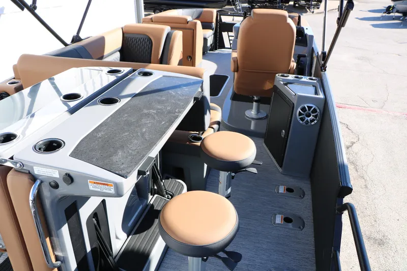 Slide: The Image of 2026 Sylvan L3 DLZ Bar Tri-Toon interior with bar seating and modern amenities. - 21