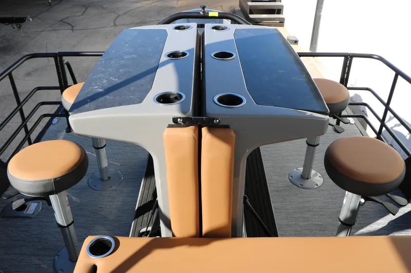 Slide: The Image of 2026 Sylvan L3 DLZ Bar Tri-Toon with bar seating and cup holders. - 25