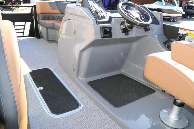 Slide: The Image of 2026 Sylvan L3 DLZ Bar Tri-Toon boat interior with modern helm and seating. - 36