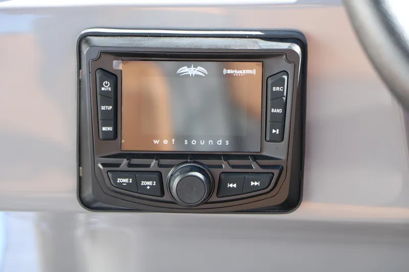 Slide: The Image of Wet Sounds audio system on 2026 Sylvan L3 DLZ Bar Tri-Toon boat dashboard. - 39