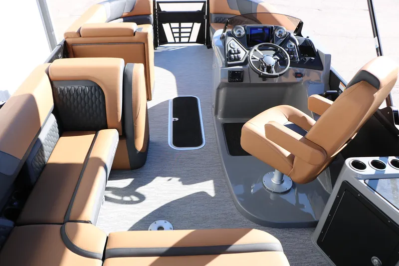 Slide: The Image of Luxurious interior of 2026 Sylvan L3 DLZ Bar Tri-Toon with plush seating and modern helm. - 47
