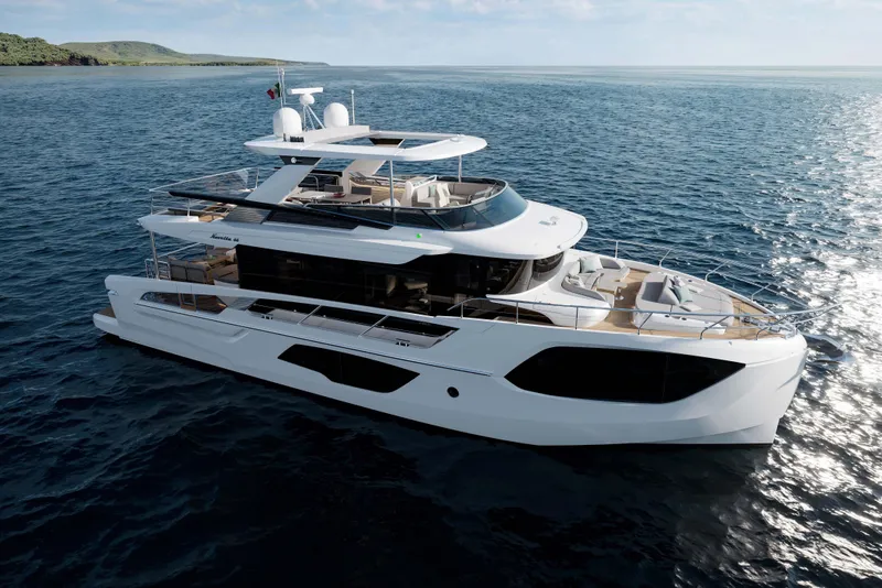 Slide: The Image of Luxury Absolute Navetta 66 yacht cruising on open sea, 2026 model. - 1