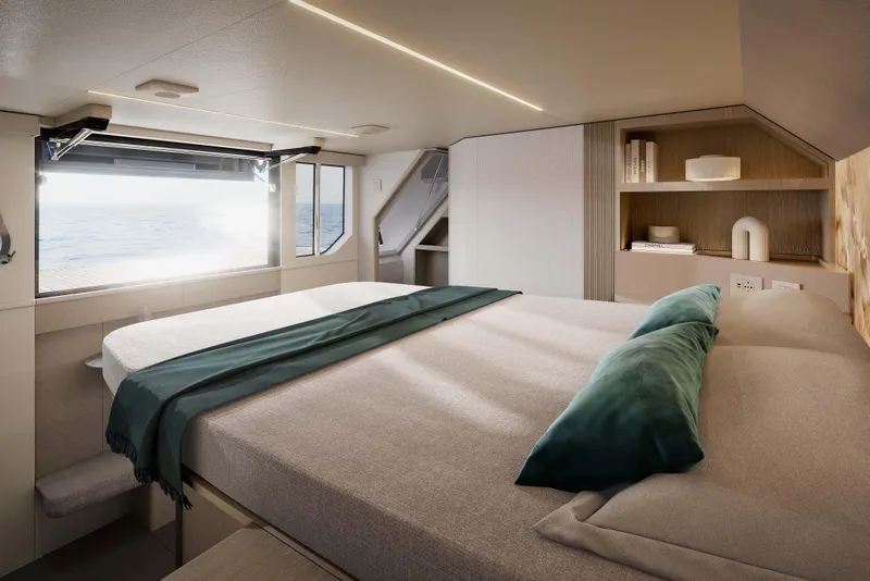 Slide: The Image of Luxurious bedroom interior of 2026 Absolute Navetta 66 yacht with ocean view. - 14