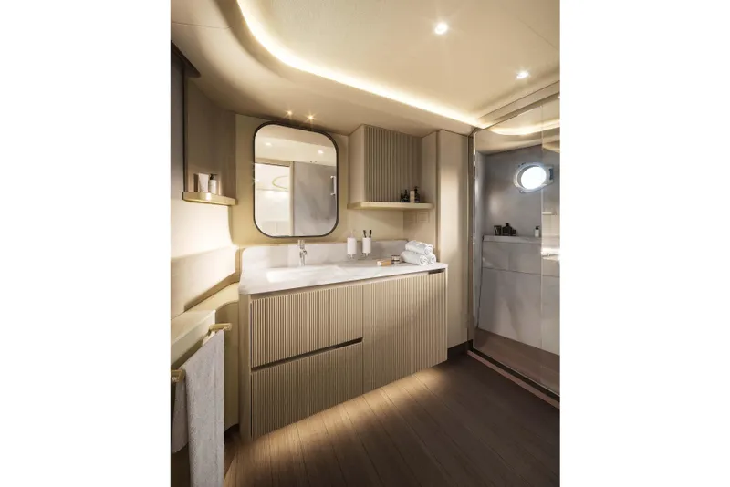 Slide: The Image of Luxurious bathroom interior of 2026 Absolute Navetta 66 yacht, featuring modern design and elegant fixtures. - 16