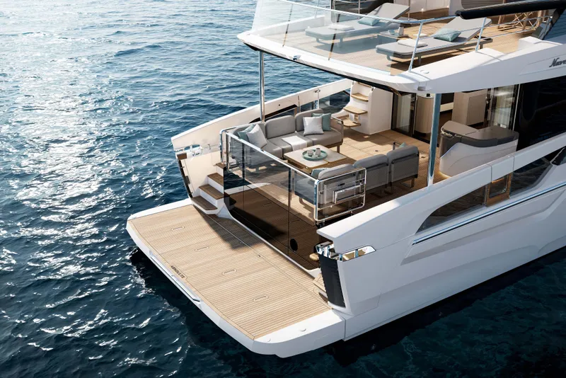 Slide: The Image of 2026 Absolute Navetta 66 yacht with luxurious deck and seating on open water. - 4