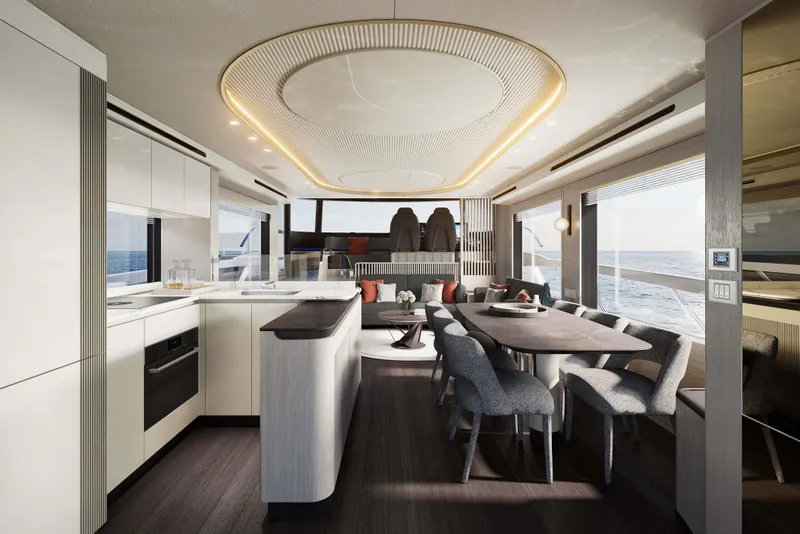 Slide: The Image of Luxurious interior of 2026 Absolute Navetta 66 yacht with modern dining and kitchen area. - 7