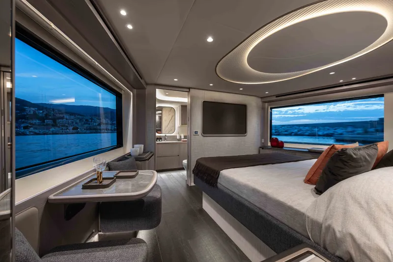 Slide: The Image of Luxurious interior of 2027 Absolute Navetta 66 yacht with panoramic windows and modern design. - 54