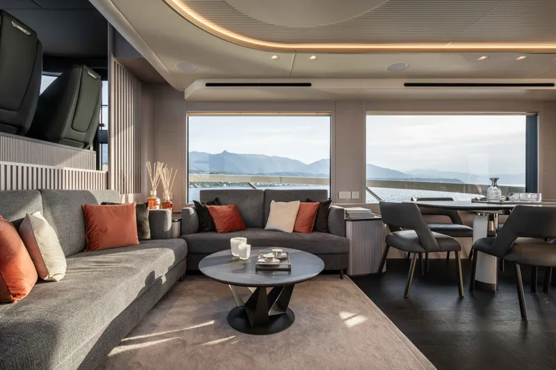 Slide: The Image of Luxurious interior of 2027 Absolute Navetta 66 yacht with elegant seating and ocean view. - 51