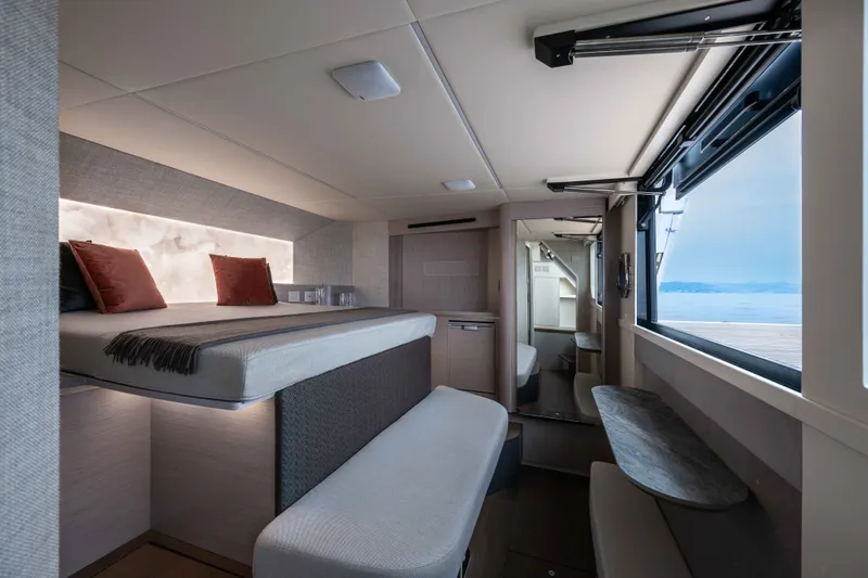Slide: The Image of Luxurious interior of 2027 Absolute Navetta 66 yacht with modern design and ocean view. - 21