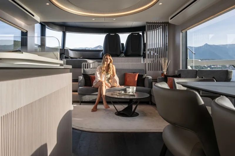 Slide: The Image of Luxurious interior of 2027 Absolute Navetta 66 yacht with modern furnishings and scenic views. - 52