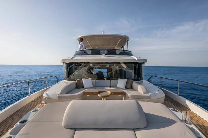 Slide: The Image of Luxurious 2027 Absolute Navetta 66 yacht with spacious deck and ocean view. - 29