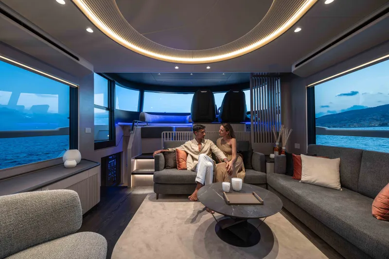 Slide: The Image of Luxurious interior of 2027 Absolute Navetta 66 yacht with couple enjoying the view. - 48