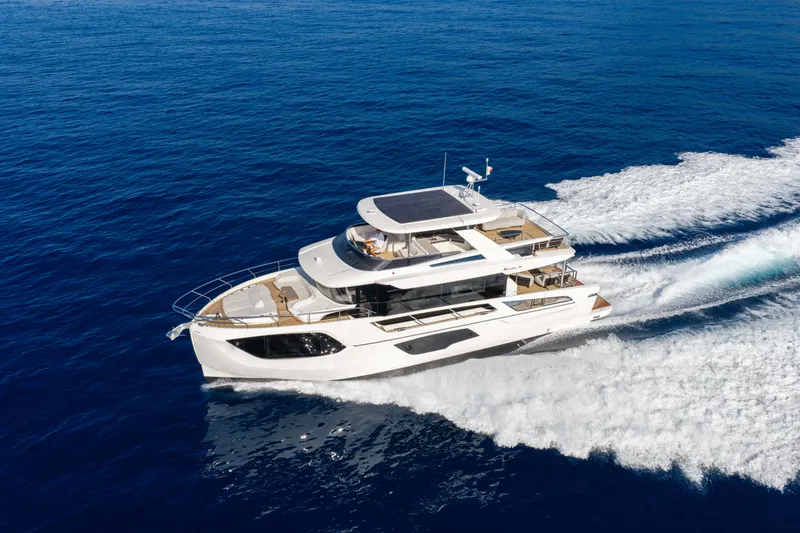 Slide: The Image of Luxury yacht Absolute Navetta 66 cruising on open sea, 2027 model. - 1