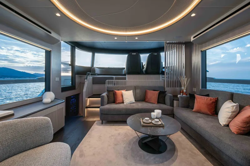 Slide: The Image of Luxurious interior of 2027 Absolute Navetta 66 yacht with ocean view and elegant seating. - 42