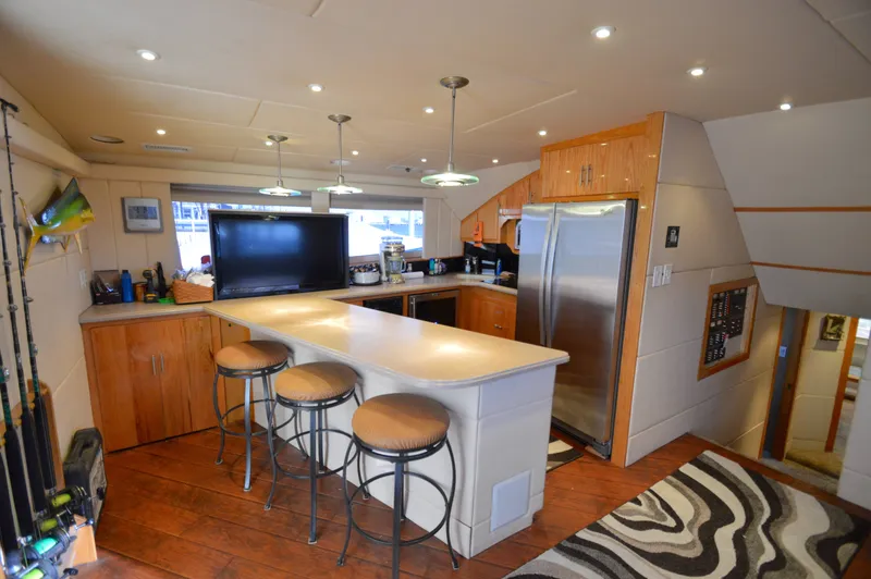 Slide: The Image of Interior of a 2004 Chesapeake 58 yacht with modern kitchen. - 3