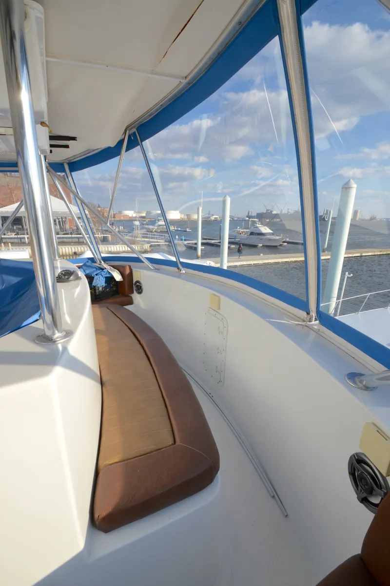 Slide: The Image of Interior view of a 2004 Chesapeake 58 yacht with harbor view. - 34