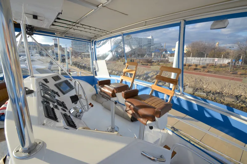 Slide: The Image of Interior view of a 2004 Chesapeake 58 boat with helm station. - 36