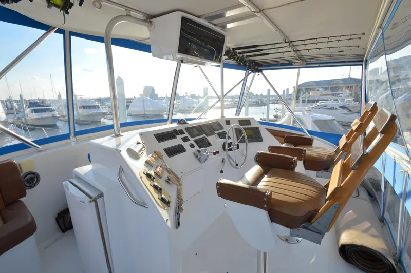 Slide: The Image of 2004 Chesapeake 58 yacht helm station in harbor. - 37