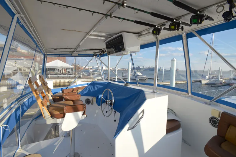 Slide: The Image of Interior view of a 2004 Chesapeake 58 boat with harbor view. - 43