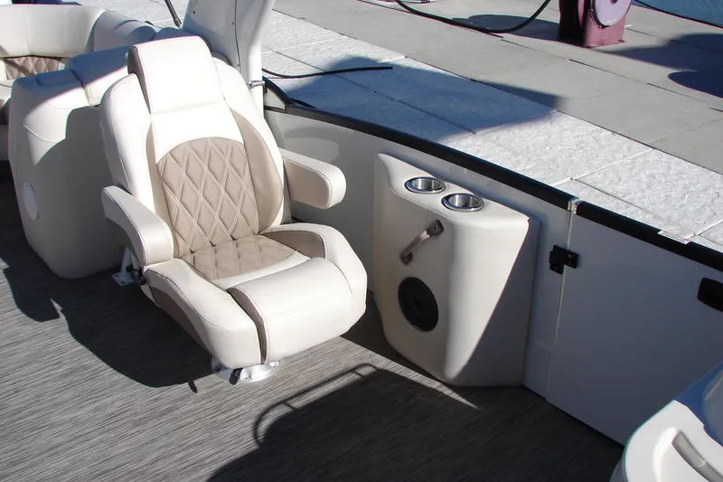 Slide: The Image of Luxurious seating on 2021 Bennington QX 30 QXFBWA X2 Wide Beam boat with cup holders. - 11
