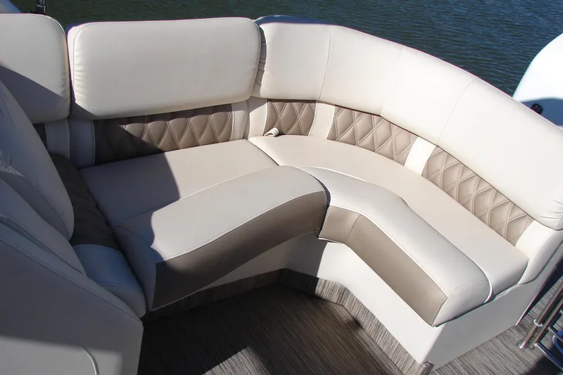 Slide: The Image of 2021 Bennington QX 30 QXFBWA X2 boat seating with beige and tan upholstery. - 14