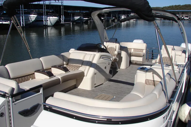 Slide: The Image of 2021 Bennington QX 30 QXFBWA X2 Wide Beam pontoon boat with luxurious seating. - 2