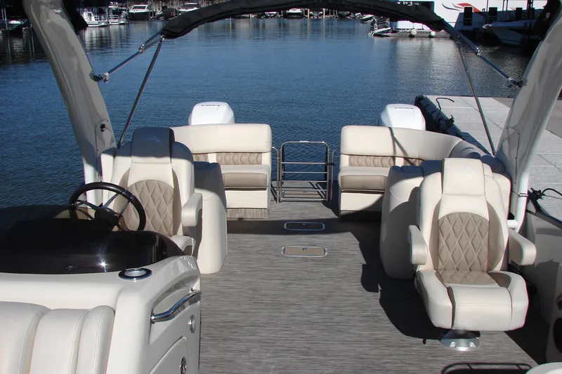 Slide: The Image of 2021 Bennington QX 30 QXFBWA X2 Wide Beam pontoon boat interior with luxurious seating. - 7
