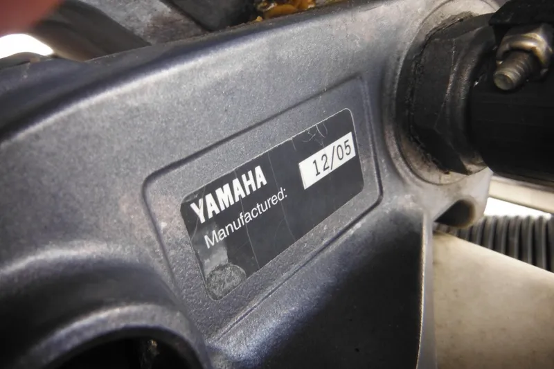 Slide: The Image of Yamaha engine label, manufactured December 2005, on a 2006 Seaswirl Striper 2301 boat. - 11